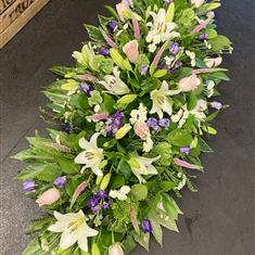 Casket spray in pastels